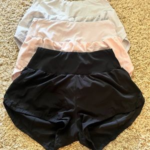 3 pack black white and pink athletic shorts size m